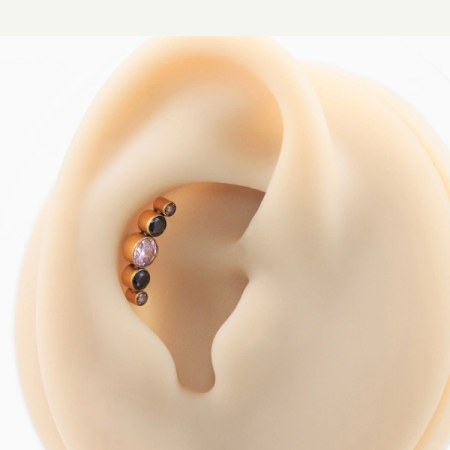 LABRET TITÂNIO PVD GOLD R/I CLUSTER 5 PEDRAS –  PRETO/ ROSA